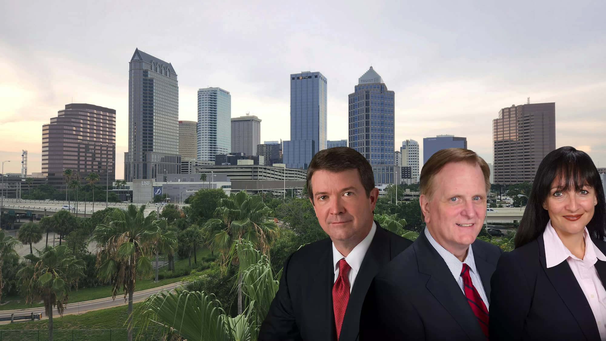 John Bales Attorneys with the Tampa skyline
